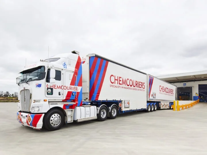 Hazardous Goods Transport - Chemcouriers - Chemcouriers B-Double driving out of depot